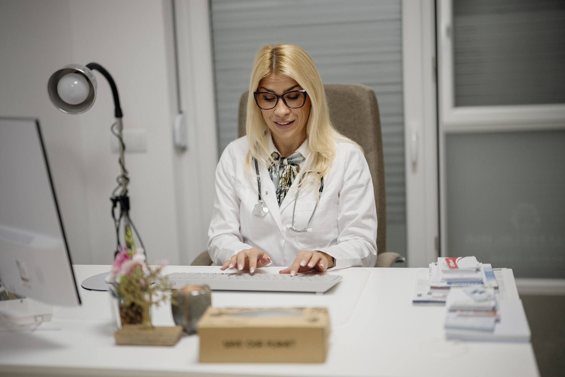 A doctor consulting with a patient in a clinic